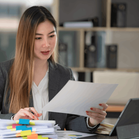 Translator preparing patient report under Certified Translation Services in Houston following quality standards.